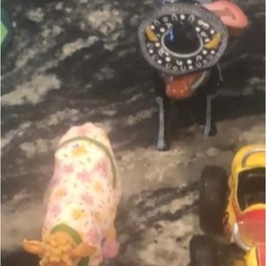 2 cow parade cows for sale. 1 matador and 1 cow in a house coat.